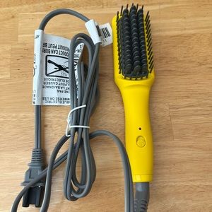 Never used Drybar mini brush crush heated travel straightening brush.
